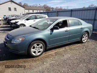 ✅ 2009 Chevrolet Malibu 1LS • VIN: 1G1ZG57B39F233414 • Lot: 77423764. Listed on Copart with 164,099 mi. Free auction sales archive from the USA and detailed vehicle history report at DreamBid. Image 1.