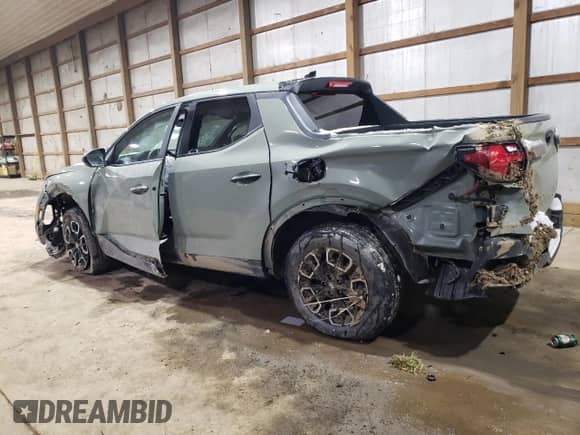 2023 Hyundai Santa Cruz SE z VIN 5NTJA4AE9PH049103, wystawiony jako Copart lot #42379435 z przebiegiem 27 793 mil mil oraz Szkoda całkowita • Salvage title. Historia ofert i sprzedaży dostępna na DreamBid. Obrazek 2.