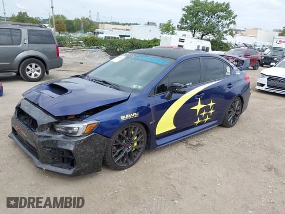 ✅ 2021 Subaru WRX STI • VIN: JF1VA2E67M9814021 • Lot: 43208944. Listed on IAAI with 68,473 mi. Free auction sales archive from the USA and detailed vehicle history report at DreamBid. Image 2.