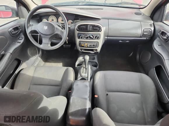 2005 Dodge Neon SXT z VIN 1B3ES56C85D129135, wystawiony jako Copart lot #59115175 z przebiegiem 148 140 mil mil oraz Szkoda całkowita • Salvage title. Historia ofert i sprzedaży dostępna na DreamBid. Obrazek 8.