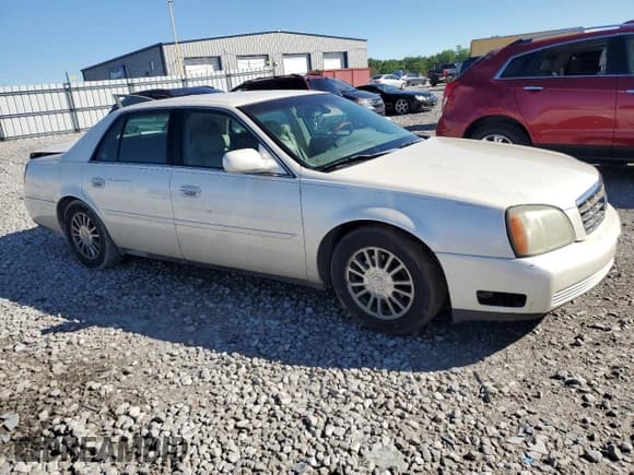 ✅ 2003 Cadillac DeVille DHS • VIN: 1G6KE54YX3U190879 • Lot: 57874555. Listed on Copart with 180,129 mi. Free auction sales archive from the USA and detailed vehicle history report at DreamBid. Image 4.