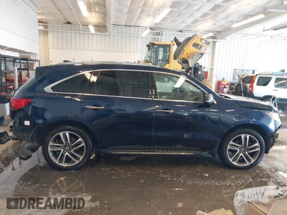 ✅ 2018 Acura MDX Advance • VIN: 5J8YD4H93JL015952 • Lot: 41240859. Listed on IAAI with 130,422 mi. Free auction sales archive from the USA and detailed vehicle history report at DreamBid. Image 14.