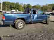 2000 Dodge Dakota Sport z VIN 1B7GG22N2YS659373, wystawiony jako Copart lot #75728094 z przebiegiem Nie podano mil oraz Szkoda całkowita • Salvage title. Historia ofert i sprzedaży dostępna na DreamBid. Obrazek 3.
