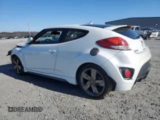 ✅ 2015 Hyundai Veloster Turbo • VIN: KMHTC6AEXFU239828 • Lot: 87089004. Wystawiony na Copart z przebiegiem 140 556 mil. Bezpłatny archiwum sprzedaży aukcyjnych z USA i szczegółowy raport historii pojazdu na DreamBid. Zdjęcie 2.