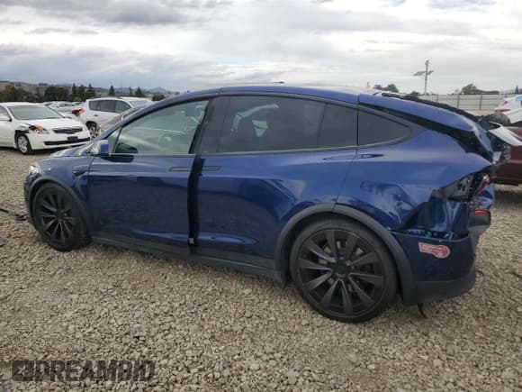 ✅ 2023 Tesla Model X • VIN: 7SAXCAE55PF415717 • Lot: 85123705. Wystawiony na Copart z przebiegiem 26 363 mil. Bezpłatny archiwum sprzedaży aukcyjnych z USA i szczegółowy raport historii pojazdu na DreamBid. Zdjęcie 2.