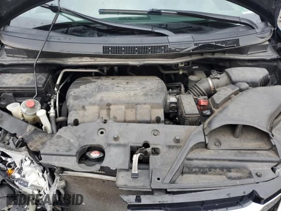 ✅ 2014 Honda Odyssey EX-L • VIN: 5FNRL5H66EB014143 • Lot: 90998015. Listed on Copart with 137,281 mi. Free auction sales archive from the USA and detailed vehicle history report at DreamBid. Image 12.