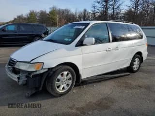 ✅ 2003 Honda Odyssey EX-L • VIN: 2HKRL18983H500423 • Lot: 52275485. Listed on Copart with 107,584 mi. Free auction sales archive from the USA and detailed vehicle history report at DreamBid. Image 1.