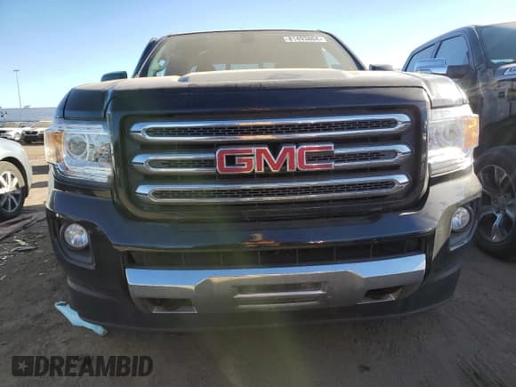 ✅ 2017 GMC Canyon 4WD SLE • VIN: 1GTH6CENXH1282385 • Lot: 81493804. Wystawiony na Copart z przebiegiem 132 281 mil. Bezpłatny archiwum sprzedaży aukcyjnych z USA i szczegółowy raport historii pojazdu na DreamBid. Zdjęcie 5.