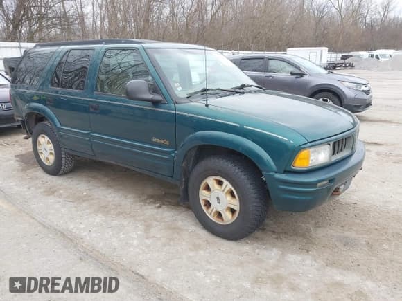 ✅ 1997 Oldsmobile Bravada • VIN: 1GHDT13W2V2706505 • Lot: 41835475. Listed on IAAI with 131,247 mi. Free auction sales archive from the USA and detailed vehicle history report at DreamBid. Image 1.