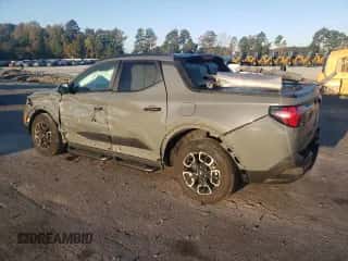 2023 Hyundai Santa Cruz SEL z VIN 5NTJCDAE5PH055040, wystawiony jako Copart lot #77162394 z przebiegiem 19 060 mil mil oraz Szkoda całkowita • Salvage title. Historia ofert i sprzedaży dostępna na DreamBid. Obrazek 2.