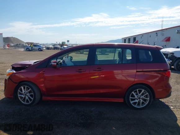 ✅ 2013 Mazda 5 Touring • VIN: JM1CW2CL5D0150270 • Lot: 42696073. Listed on IAAI with 98,715 mi. Free auction sales archive from the USA and detailed vehicle history report at DreamBid. Image 14.