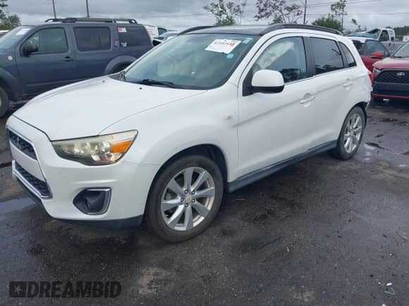 2014 Mitsubishi Outlander SE z VIN 4A4AP4AU6EE003514, wystawiony jako IAAI lot #43403657 z przebiegiem 183 838 mil mil oraz . Historia ofert i sprzedaży dostępna na DreamBid. Obrazek 17.