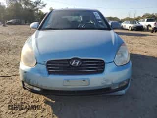 2007 Hyundai Accent SE z VIN KMHCN36C47U007078, wystawiony jako Copart lot #75810994 z przebiegiem 73 344 mil mil oraz Szkoda całkowita • Salvage title. Historia ofert i sprzedaży dostępna na DreamBid. Obrazek 5.
