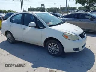 ✅ 2008 Suzuki SX4 • VIN: JS2YC412585103257 • Lot: 42273493. Listed on IAAI with 157,447 mi. Free auction sales archive from the USA and detailed vehicle history report at DreamBid. Image 1.