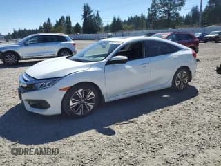✅ 2018 Honda Civic EX-L • VIN: JHMFC1F88JX041083 • Лот: 68244135. Опубликован ранее на Copart с пробегом 98 648 миль. Бесплатный доступ к архиву аукционных продаж из США и подробный отчёт об истории автомобиля на DreamBid. Изображение 1.
