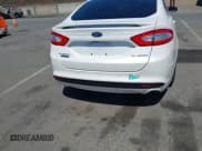 ✅ 2016 Ford Fusion Titanium • VIN: 3FA6P0SU2GR357508 • Lot: 42551834. Listed on IAAI with 177,425 mi. Free auction sales archive from the USA and detailed vehicle history report at DreamBid. Image 16.