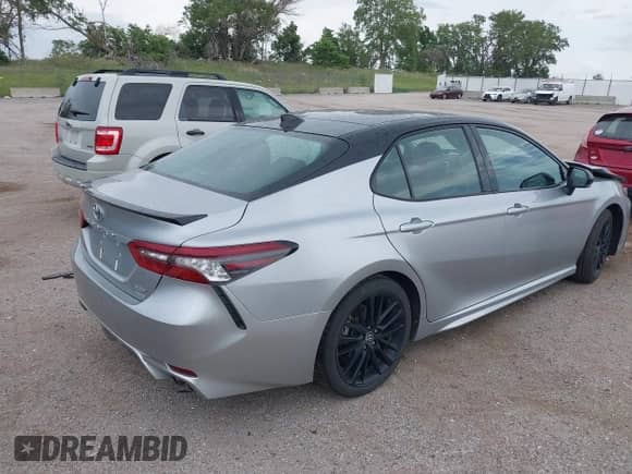 2021 Toyota Camry XSE with VIN 4T1K61BK3MU028249, listed as a IAAI auction lot 42553485 with 130,614 mi miles and . Bid and sale history available at DreamBid. Image 4.