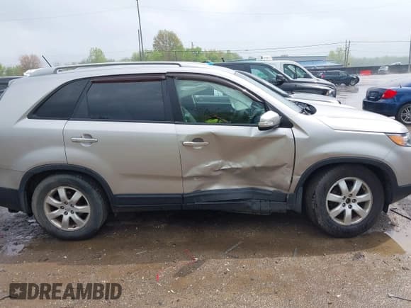 ✅ 2013 Kia Sorento LX • VIN: 5XYKT3A67DG317309 • Lot: 42178502. Listed on IAAI with 62,702 mi. Free auction sales archive from the USA and detailed vehicle history report at DreamBid. Image 13.