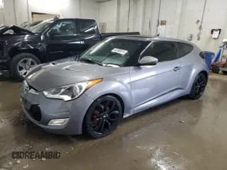 ✅ 2013 Hyundai Veloster w/Gray Int • VIN: KMHTC6AD0DU103406 • Lot: 65398974. Wystawiony na Copart z przebiegiem 170 120 mil. Bezpłatny archiwum sprzedaży aukcyjnych z USA i szczegółowy raport historii pojazdu na DreamBid. Zdjęcie 1.