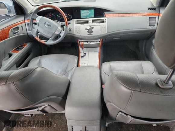 ✅ 2007 Toyota Avalon XL • VIN: 4T1BK36B07U177966 • Лот: 71988685. Опубликован ранее на Copart с пробегом 231 071 миль. Бесплатный доступ к архиву аукционных продаж из США и подробный отчёт об истории автомобиля на DreamBid. Изображение 8.