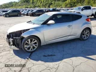 2016 Hyundai Veloster z VIN KMHTC6AD9GU269041, wystawiony jako Copart lot #70952574 z przebiegiem 146 798 mil mil oraz Szkoda całkowita • Salvage title. Historia ofert i sprzedaży dostępna na DreamBid. Obrazek 1.