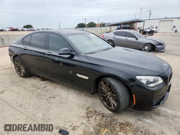 ✅ 2015 BMW 7 Series 750i • VIN: WBAYA8C54FG197788 • Lot: 63431285. Listed on Copart with 114,581 mi. Free auction sales archive from the USA and detailed vehicle history report at DreamBid. Image 4.