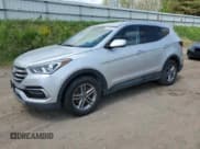 ✅ 2017 Hyundai Santa Fe 2.4L • VIN: 5XYZTDLB9HG466552 • Lot: 57265315. Listed on Copart with 123,390 mi. Free auction sales archive from the USA and detailed vehicle history report at DreamBid. Image 1.