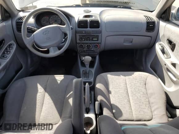 2005 Hyundai Accent GLS z VIN KMHCG45C65U625887, wystawiony jako Copart lot #48824225 z przebiegiem 110 594 mil mil oraz Szkoda całkowita • Salvage title. Historia ofert i sprzedaży dostępna na DreamBid. Obrazek 8.