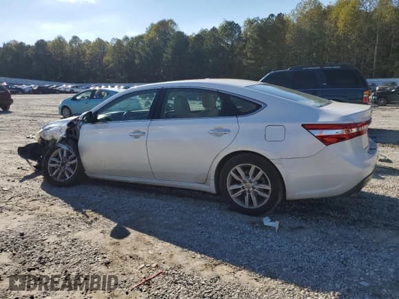 ✅ 2013 Toyota Avalon XLE Premium • VIN: 4T1BK1EB0DU077061 • Lot: 90361645. Listed on Copart with 117,795 mi. Free auction sales archive from the USA and detailed vehicle history report at DreamBid. Image 2.