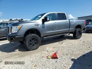 ✅ 2017 Nissan Titan S • VIN: 1N6AA1F31HN550814 • Lot: 74151354. Listed on Copart with 81,857 mi. Free auction sales archive from the USA and detailed vehicle history report at DreamBid. Image 1.