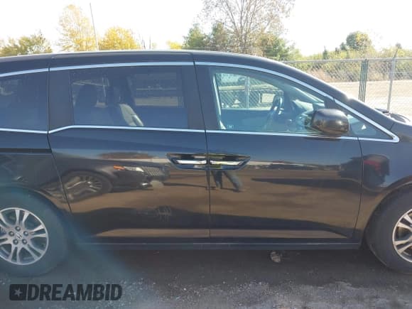 ✅ 2012 Honda Odyssey EX-L • VIN: 5FNRL5H60CB140575 • Lot: 43605156. Listed on IAAI with Not provided. Free auction sales archive from the USA and detailed vehicle history report at DreamBid. Image 13.