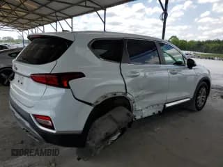 ✅ 2019 Hyundai Santa Fe SE • VIN: 5NMS23AD3KH018761 • Lot: 55953534. Wystawiony na Copart z przebiegiem 88 011 mil. Bezpłatny archiwum sprzedaży aukcyjnych z USA i szczegółowy raport historii pojazdu na DreamBid. Zdjęcie 3.