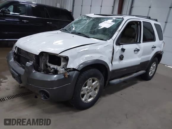 ✅ 2006 Ford Escape XLT • VIN: 1FMCU93156KC93719 • Lot: 41995488. Listed on IAAI with 218,213 mi. Free auction sales archive from the USA and detailed vehicle history report at DreamBid. Image 18.