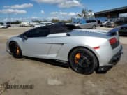✅ 2013 Lamborghini Gallardo • VIN: ZHWGU8AJ7DLA12671 • Lot: 75721804. Listed on Copart with 14,849 mi. Free auction sales archive from the USA and detailed vehicle history report at DreamBid. Image 2.