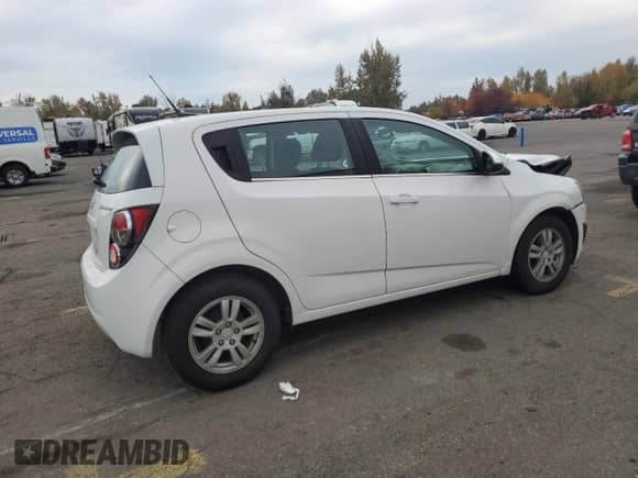 2013 Chevrolet Sonic LT with VIN 1G1JC6SG0D4230167, listed as a Copart auction lot 90614715 with 143,604 mi miles and Clean title. Bid and sale history available at DreamBid. Image 3.
