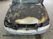 ✅ 2003 Kia Optima LX • VIN: KNAGD126335211255 • Лот: 60637665. Опубликован ранее на Copart с пробегом Не указан. Бесплатный доступ к архиву аукционных продаж из США и подробный отчёт об истории автомобиля на DreamBid. Изображение 11.