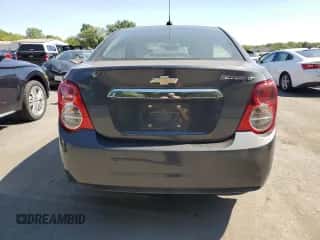 2016 Chevrolet Sonic LT с VIN 1G1JC5SG3G4145693, выставлен на аукционе Copart как лот 70100034 с пробегом 90 013 миль миль и Списание • Salvage title. История ставок и продаж доступна на DreamBid. Изображение 6.