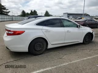 ✅ 2013 Hyundai Azera • VIN: KMHFH4JG8DA330471 • Лот: 70114735. Опубликован ранее на Copart с пробегом 107 874 миль. Бесплатный доступ к архиву аукционных продаж из США и подробный отчёт об истории автомобиля на DreamBid. Изображение 3.