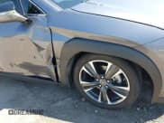 ✅ 2021 Lexus UX 250h • VIN: JTHX9JBH3M2042734 • Lot: 42737482. Listed on IAAI with 37,703 mi. Free auction sales archive from the USA and detailed vehicle history report at DreamBid. Image 6.