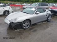 ✅ 2003 Porsche Boxster • VIN: WP0CA29873U622672 • Lot: 42365548. Listed on IAAI with 28,619 mi. Free auction sales archive from the USA and detailed vehicle history report at DreamBid. Image 2.