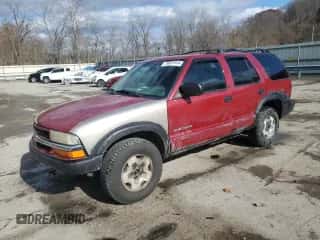 2003 Chevrolet Blazer LS z VIN 1GNDT13X73K186384, wystawiony jako Copart lot #78837914 z przebiegiem 241 159 mil mil oraz Szkoda całkowita • Salvage title. Historia ofert i sprzedaży dostępna na DreamBid. Obrazek 1.
