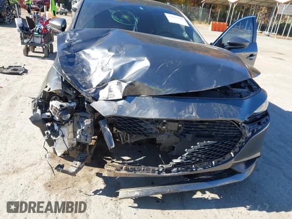 ✅ 2023 Mazda 3 S Select • VIN: 3MZBPABMXPM358463 • Lot: 43643544. Listed on IAAI with 56,857 mi. Free auction sales archive from the USA and detailed vehicle history report at DreamBid. Image 6.