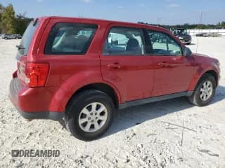 ✅ 2011 Mazda Tribute Sport • VIN: 4F2CY0C7XBKM00671 • Лот: 75431144. Опубликован ранее на Copart с пробегом 140 748 миль. Бесплатный доступ к архиву аукционных продаж из США и подробный отчёт об истории автомобиля на DreamBid. Изображение 3.