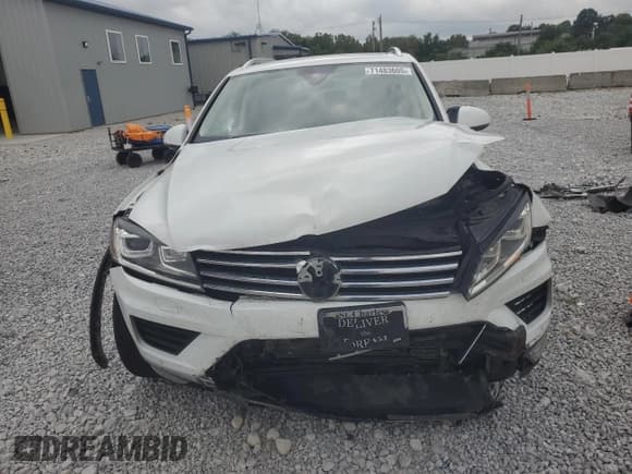 ✅ 2017 Volkswagen Touareg Executive • VIN: WVGGF7BP9HD001146 • Lot: 71483605. Listed on Copart with 143,912 mi. Free auction sales archive from the USA and detailed vehicle history report at DreamBid. Image 5.