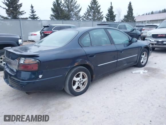 ✅ 2002 Pontiac Bonneville SE • VIN: 1G2HX54K924136229 • Lot: 41061953. Wystawiony na IAAI z przebiegiem 259 595 mil. Bezpłatny archiwum sprzedaży aukcyjnych z USA i szczegółowy raport historii pojazdu na DreamBid. Zdjęcie 4.