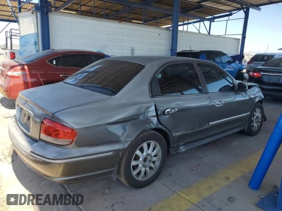 2002 Hyundai Sonata GLS с VIN KMHWF35H52A695318, выставлен на аукционе Copart как лот 58636464 с пробегом 144 023 миль миль и Списание • Salvage title. История ставок и продаж доступна на DreamBid. Изображение 3.