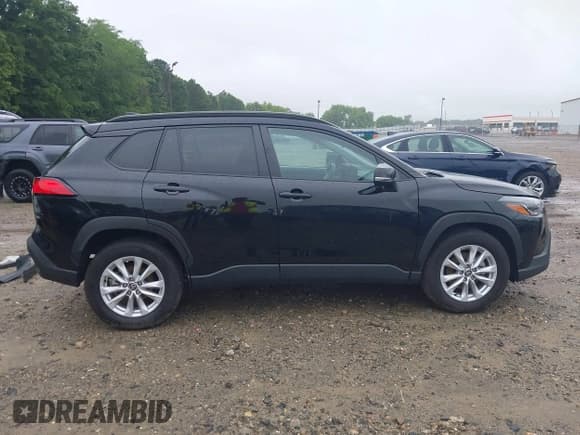 ✅ 2023 Toyota Corolla Cross LE • VIN: 7MUCAAAG0PV053404 • Лот: 42318679. Опубликован ранее на IAAI с пробегом 34 969 миль. Бесплатный доступ к архиву аукционных продаж из США и подробный отчёт об истории автомобиля на DreamBid. Изображение 14.