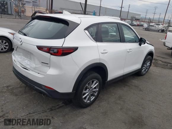 ✅ 2023 Mazda CX-5 S • VIN: JM3KFBAM5P0159733 • Лот: 43101223. Опубликован ранее на IAAI с пробегом 22 283 миль. Бесплатный доступ к архиву аукционных продаж из США и подробный отчёт об истории автомобиля на DreamBid. Изображение 4.
