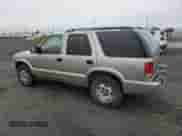 2002 Chevrolet Blazer LS z VIN 1GNDT13W02K155161, wystawiony jako Copart lot #80033774 z przebiegiem 145 425 mil mil oraz Szkoda całkowita • Salvage title. Historia ofert i sprzedaży dostępna na DreamBid. Obrazek 2.