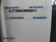 ✅ 2009 Pontiac G3 • VIN: KL2TD66E59B666511 • Lot: 43268035. Listed on Copart with 138,439 mi. Free auction sales archive from the USA and detailed vehicle history report at DreamBid. Image 12.